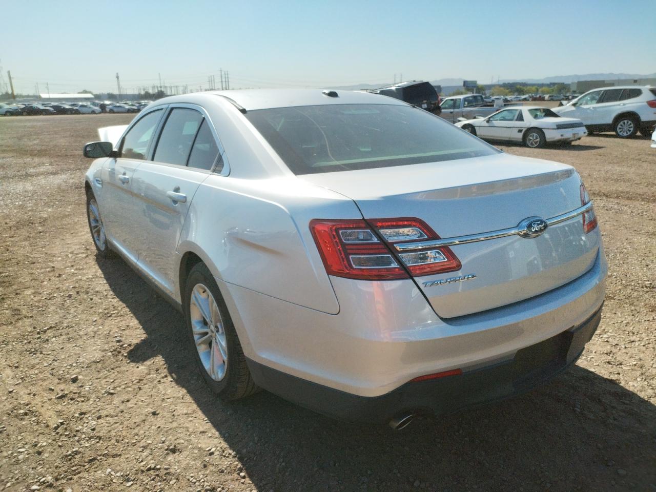 Photo 3 from auction – 2015 FORD TAURUS SE with VIN 1FAHP2D81FG184543