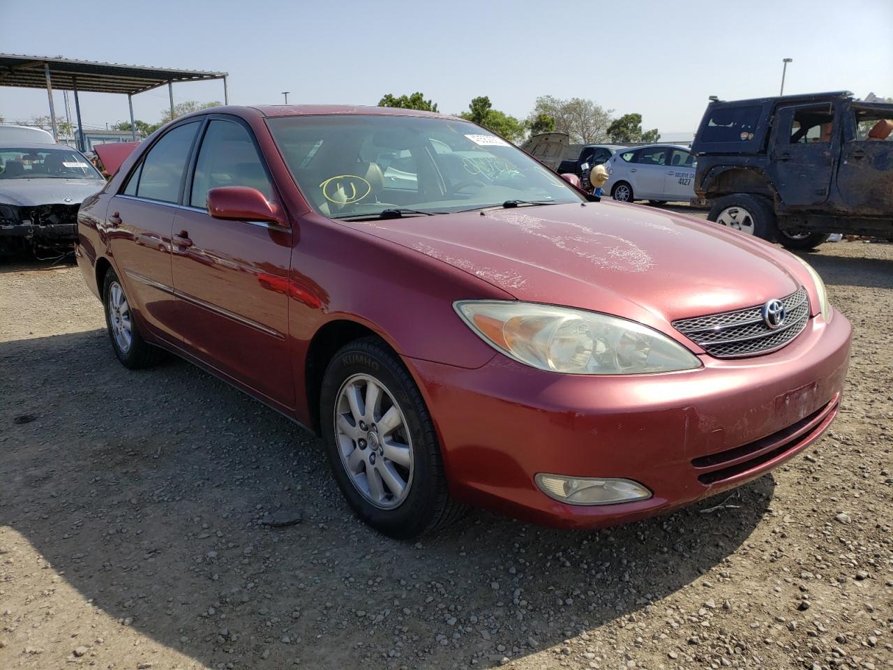 Photo 1 from auction – 2003 TOYOTA CAMRY LE with VIN JTDBE32K730170533