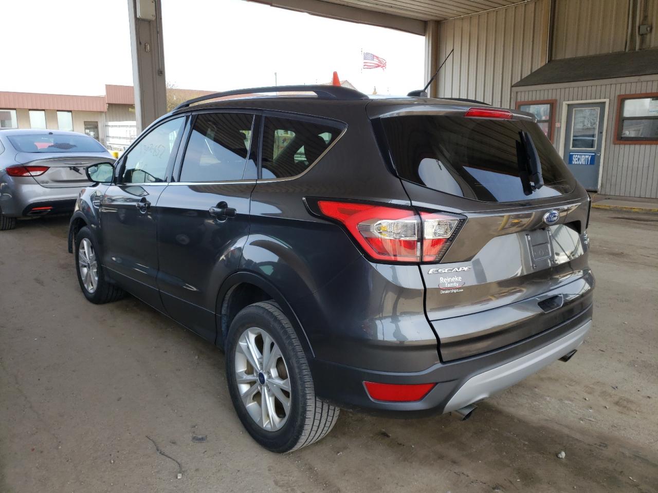 Photo 3 from auction – 2018 FORD ESCAPE SE with VIN 1FMCU0GD4JUB07715
