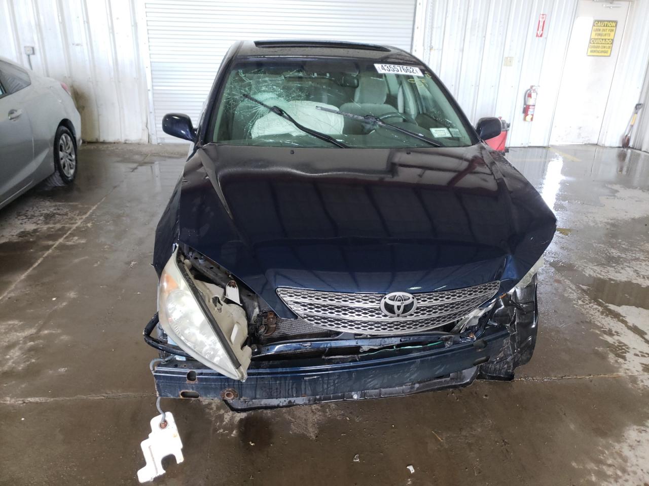 Photo 9 from auction – 2002 TOYOTA CAMRY LE with VIN JTDBE30K520049601