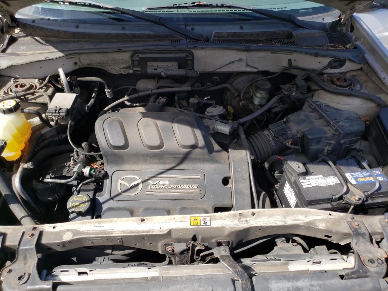 Photo 7 from auction – 2002 MAZDA TRIBUTE with VIN 4F2YU08122KM01870