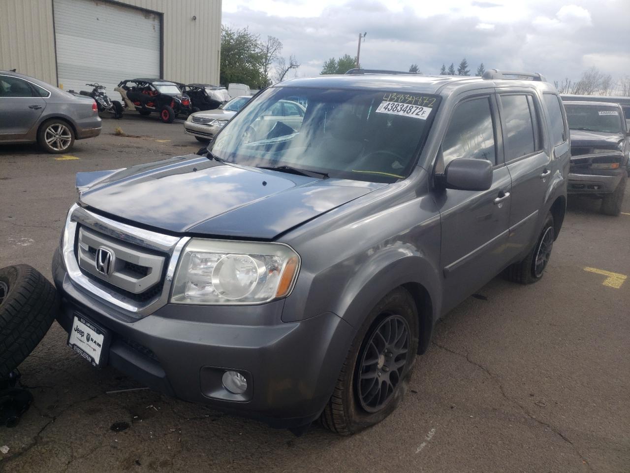 Photo 2 from auction – 2011 HONDA PILOT EXLN with VIN 5FNYF4H74BB090686