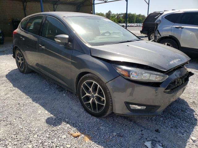 FORD FOCUS SEL 2017 with VIN 1FADP3M21HL218331 - Photo from auction