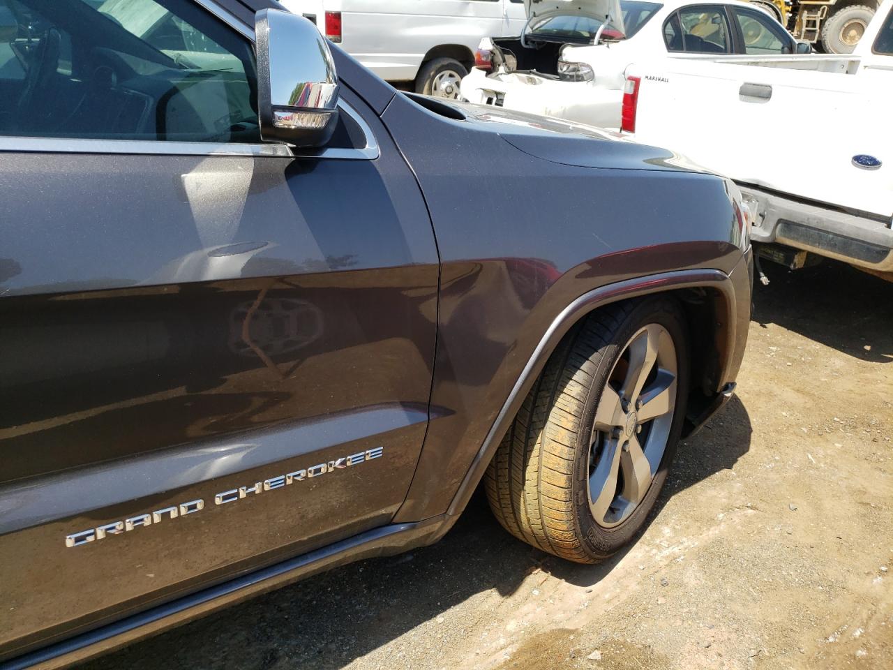 Photo 9 from auction – 2014 JEEP GRAND CHER with VIN 1C4RJECT3EC212274