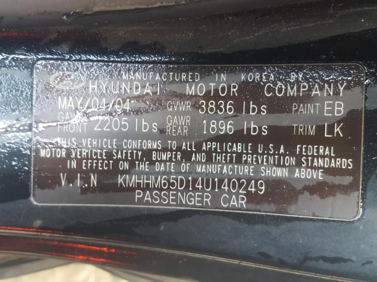 Photo 10 from auction – 2004 HYUNDAI TIBURON with VIN KMHHM65D14U140249