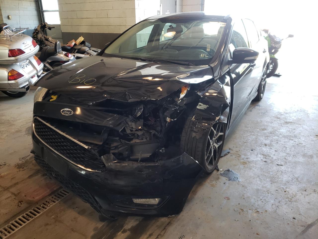 Photo 2 from auction – 2015 FORD FOCUS with VIN 1FADP3K21FL362803