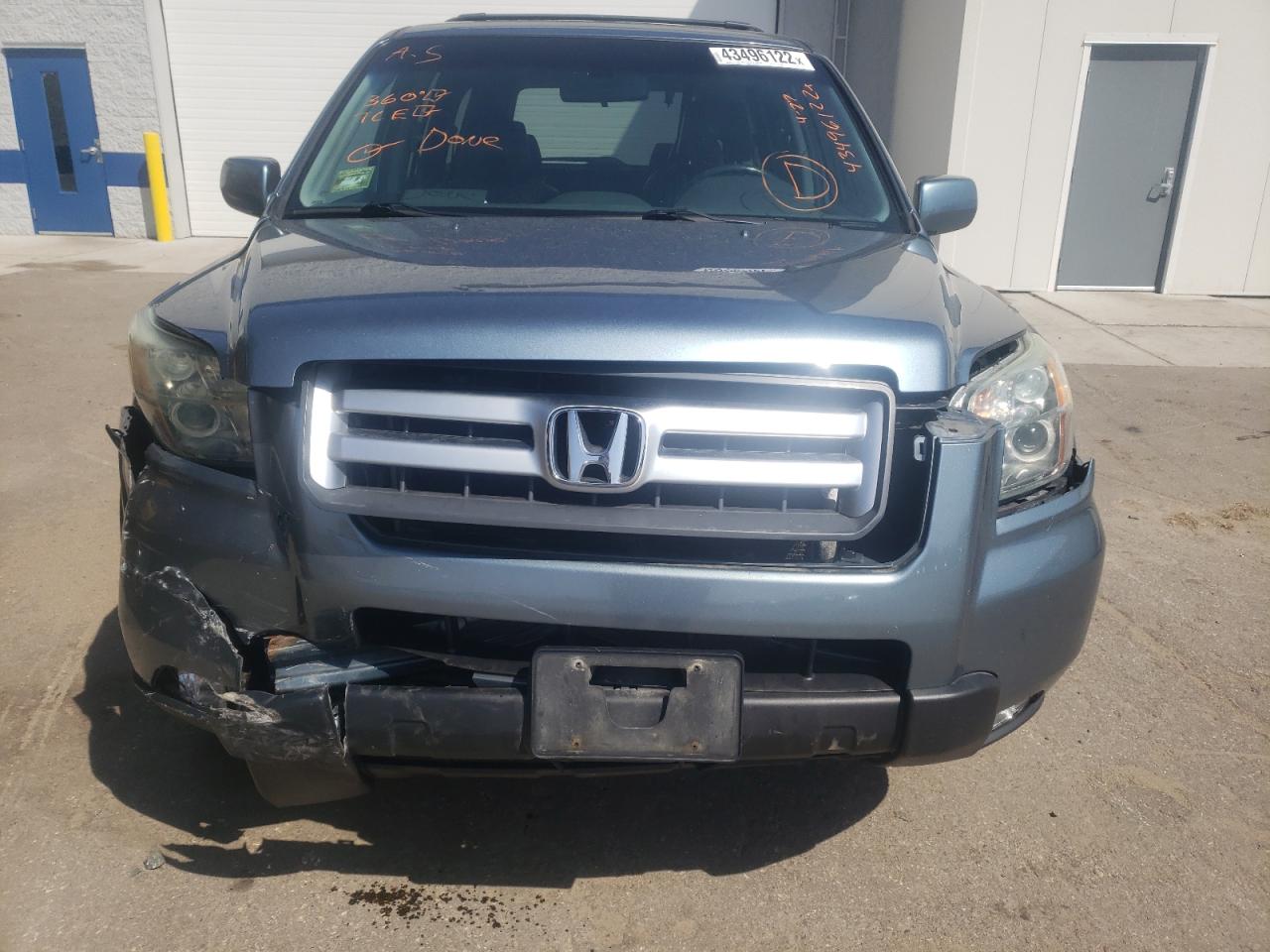Photo 9 from auction – 2006 HONDA PILOT EX with VIN 2HKYF18596H521818