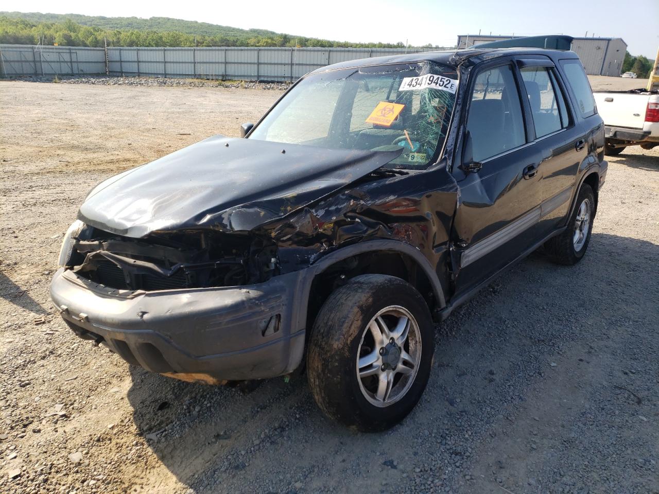 Photo 2 from auction – 1998 HONDA CR-V EX with VIN JHLRD1860WC043354