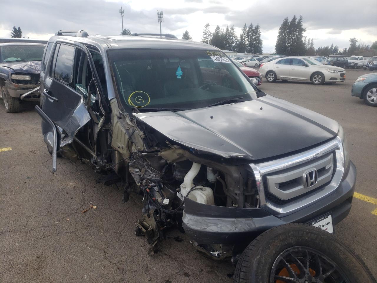 HONDA PILOT EXLN 2011 with VIN 5FNYF4H74BB090686 - Photo from auction
