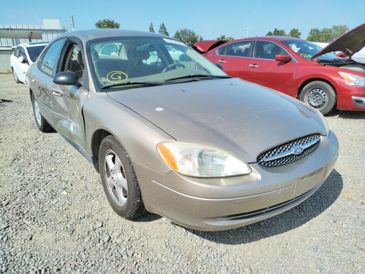 FORD TAURUS LX 2003 with VIN 1FAFP52U53G205303 - Photo from auction