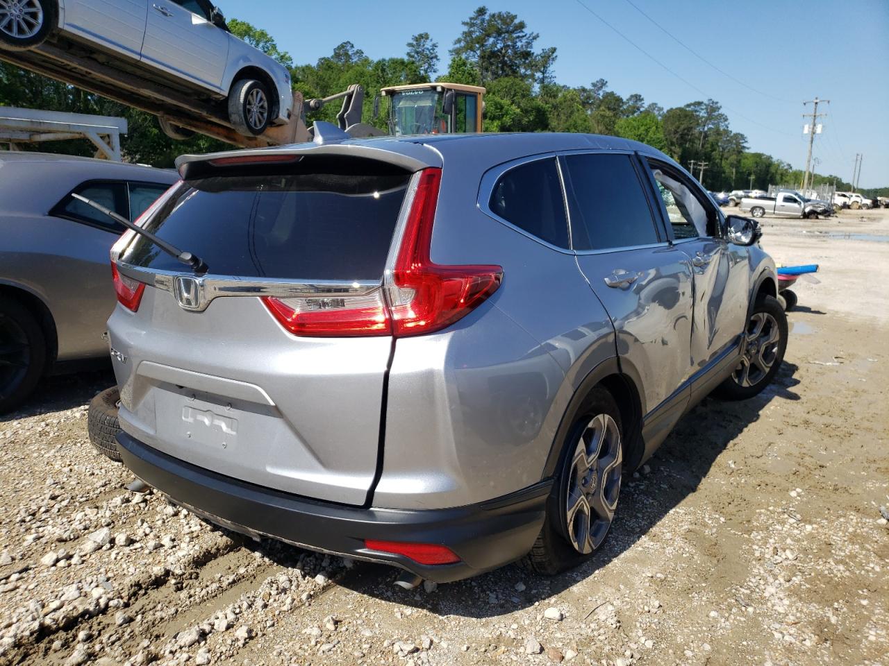 Photo 4 from auction – 2019 HONDA CR-V EX with VIN 7FARW1H59KE033552