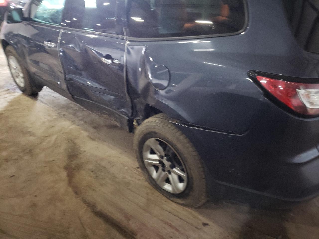 Photo 9 from auction – 2013 CHEVROLET TRAVERSE L with VIN 1GNKRFKD9DJ141884