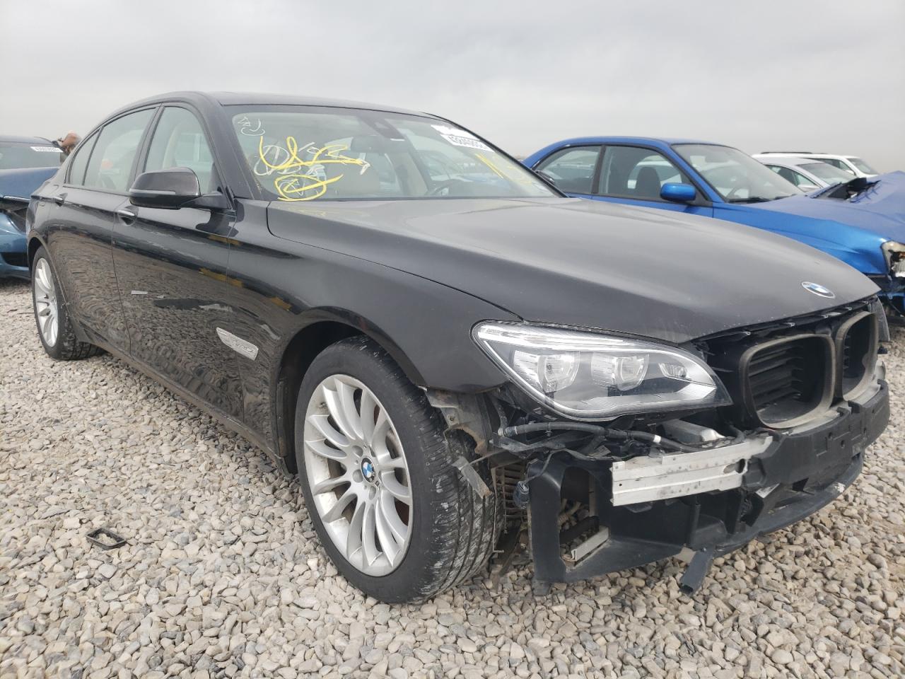 BMW 750 2015 مع رقم تعريف المركبة WBAYF8C50FD654289 - صورة من المزاد