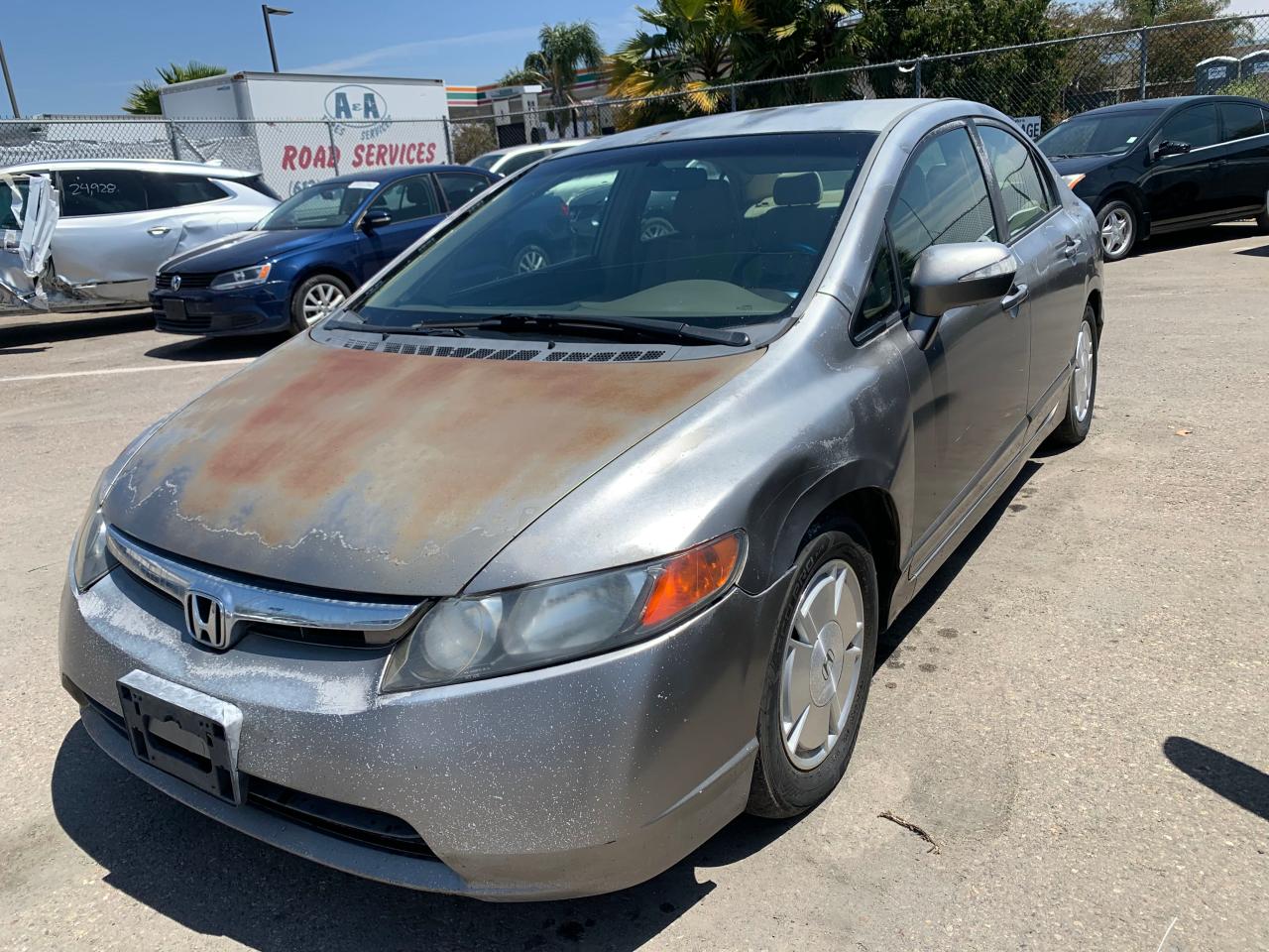Photo 2 from auction – 2006 HONDA CIVIC HYBR with VIN JHMFA36286S020252