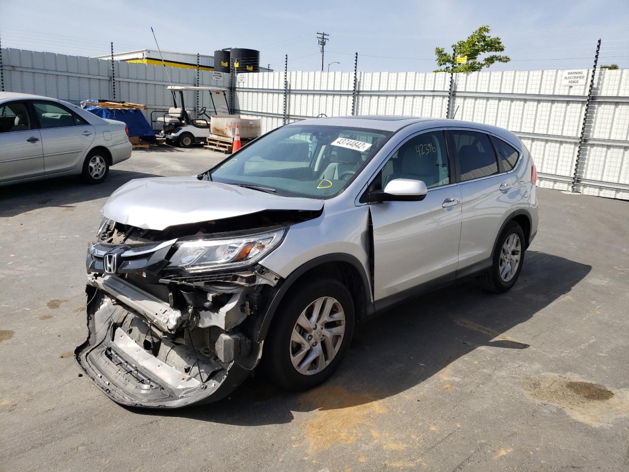 Photo 2 from auction – 2015 HONDA CR-V EX with VIN 2HKRM3H54FH519125