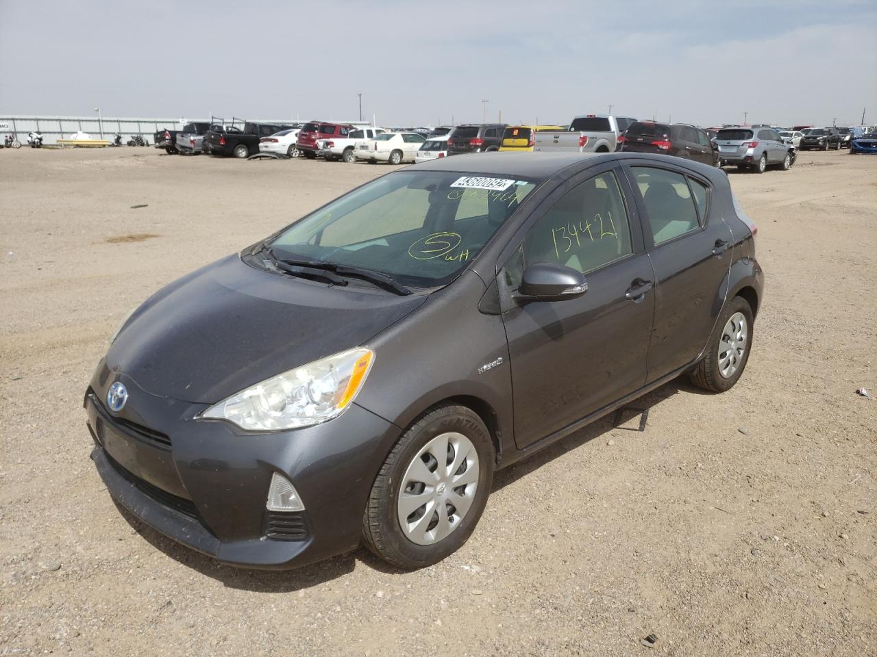 Photo 2 from auction – 2014 TOYOTA PRIUS C with VIN JTDKDTB30E1082464