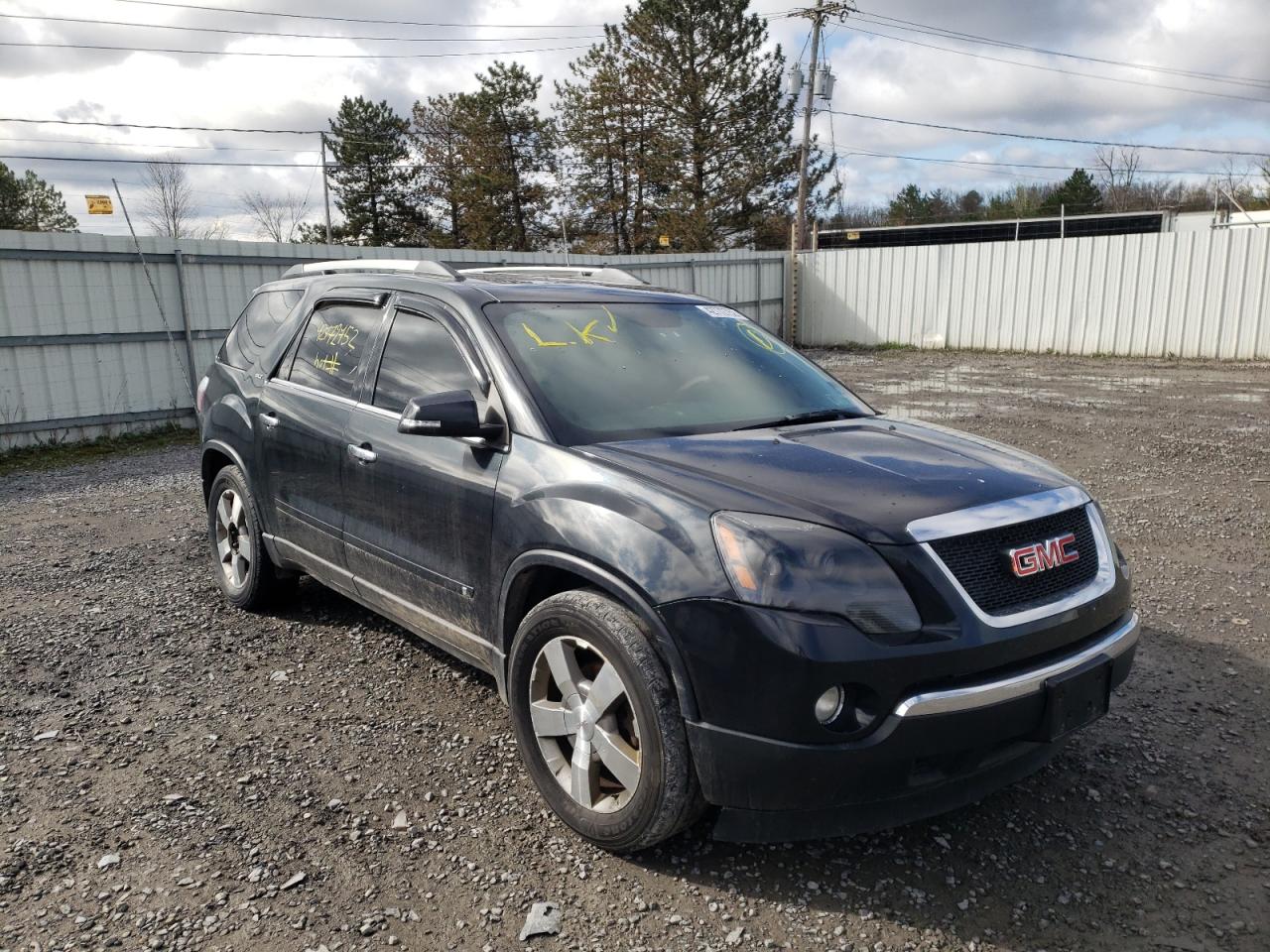 GMC ACADIA SLT 2010 with VIN 1GKLVNED6AJ128489 - Photo from auction