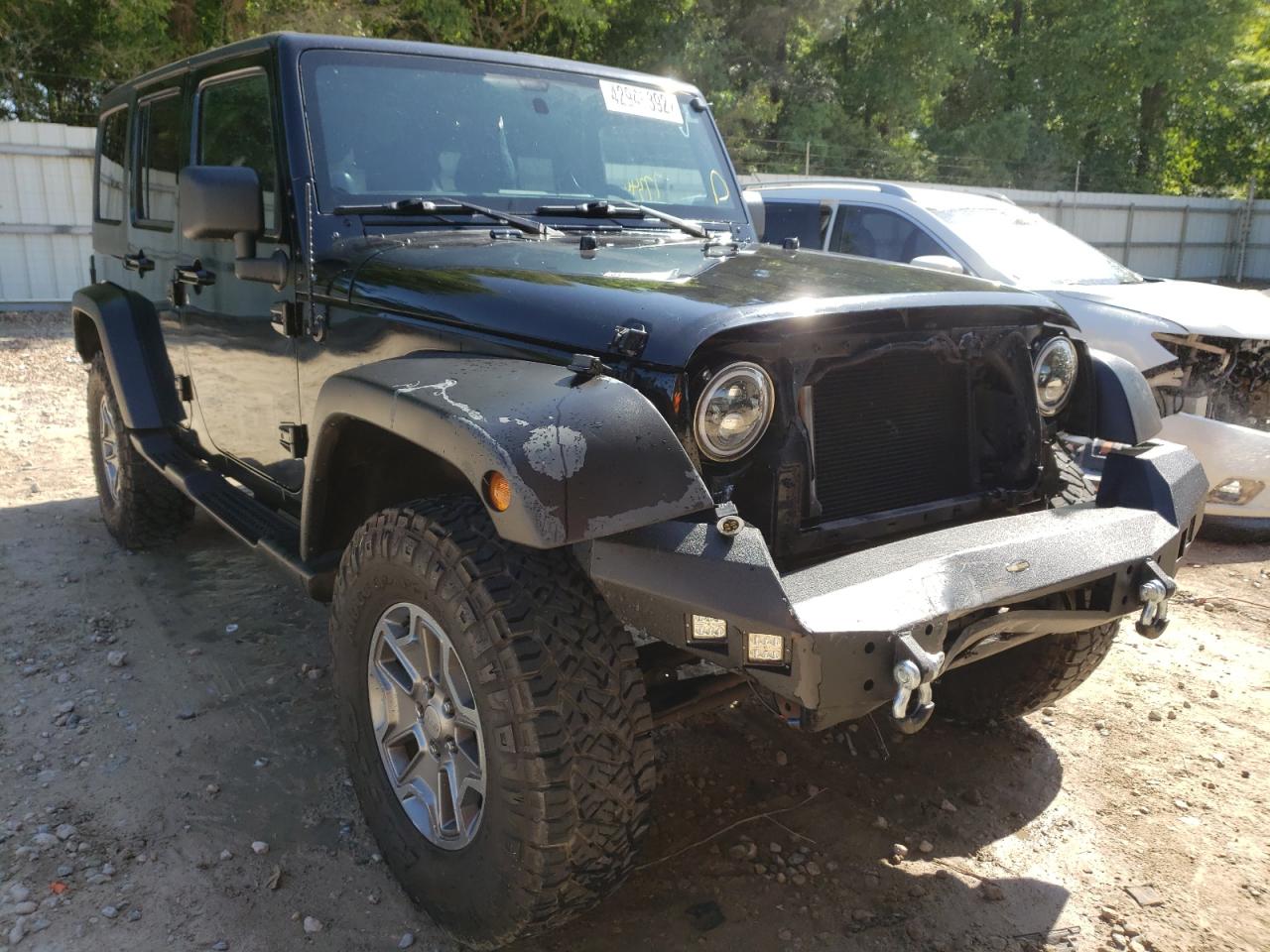 JEEP WRANGLER U 2011 with VIN 1J4BA3H13BL580750 - Photo from auction