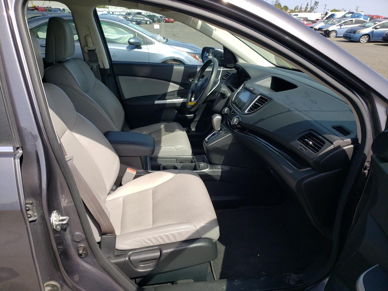 Photo 5 from auction – 2015 HONDA CR-V EXL with VIN 2HKRM3H74FH540204