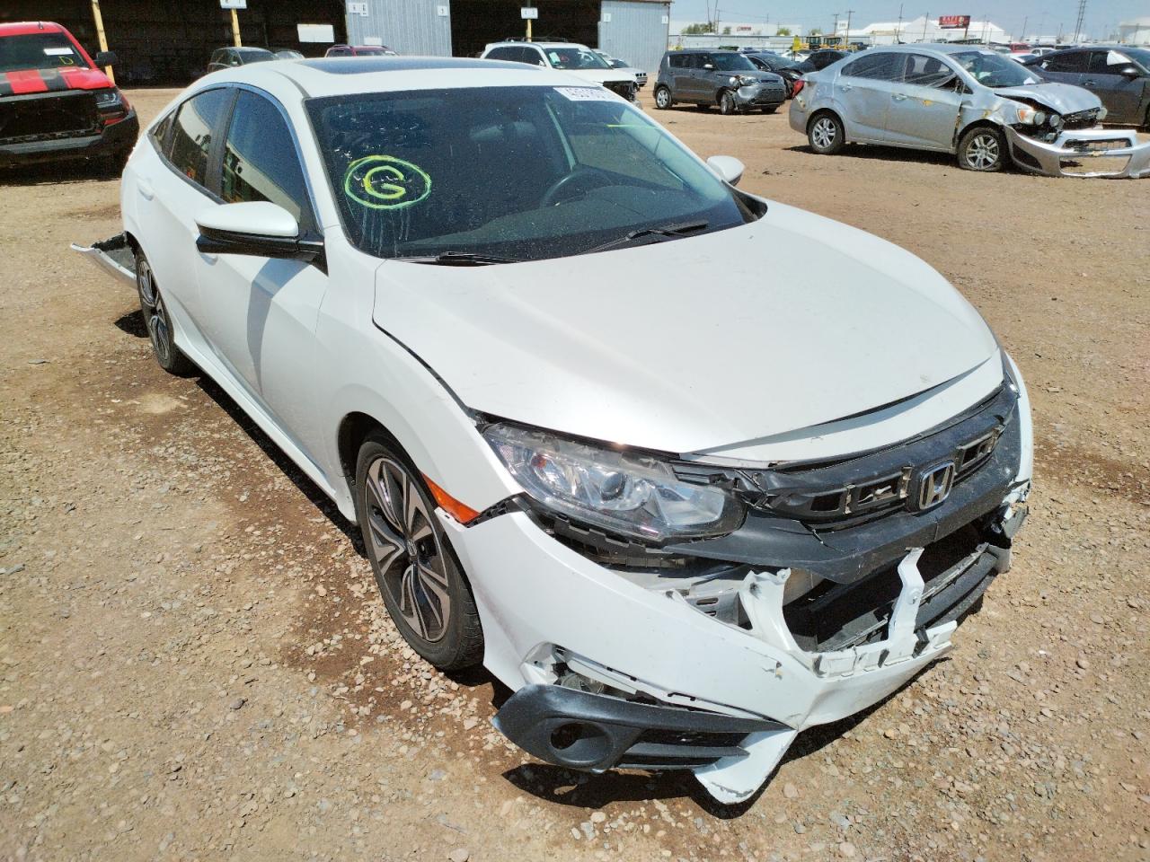 HONDA CIVIC EX 2018 with VIN JHMFC1F33JX011803 - Photo from auction