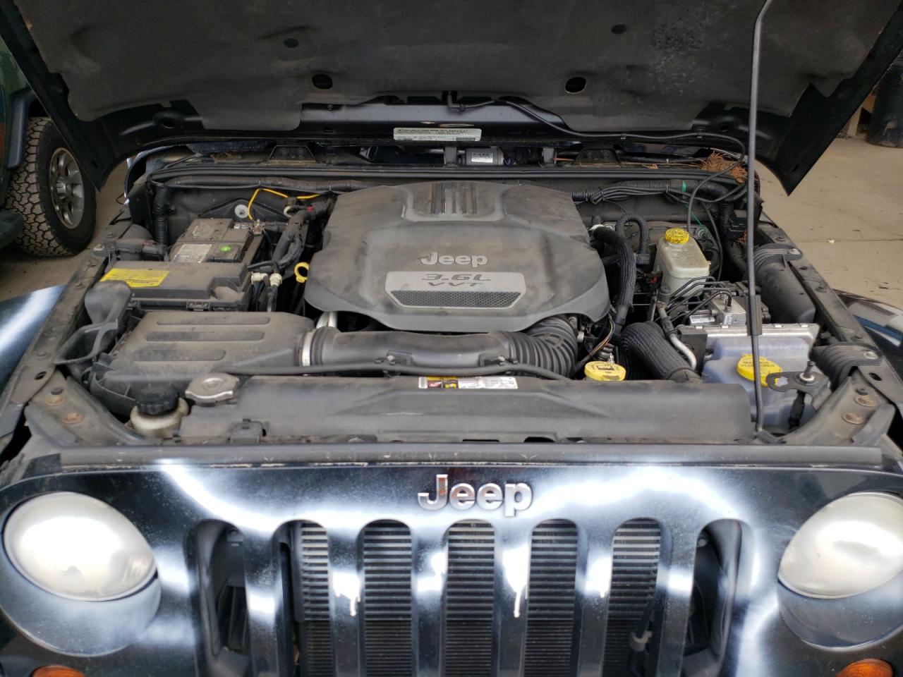 Photo 7 from auction – 2012 JEEP WRANGLER U with VIN 1C4BJWEG9CL279062