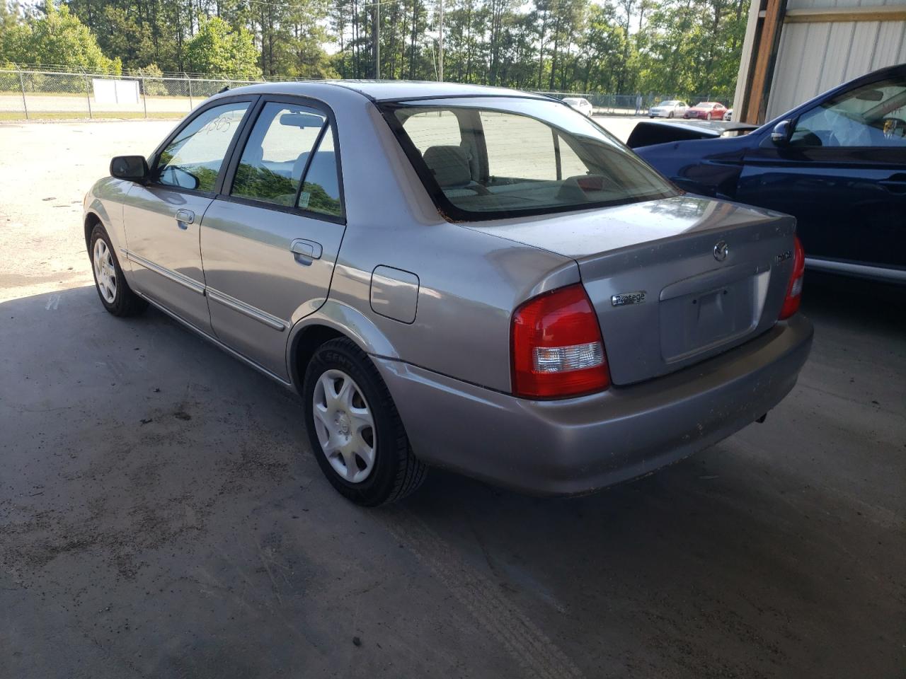 Photo 3 from auction – 1999 MAZDA PROTEGE DX with VIN JM1BJ2229X0130532