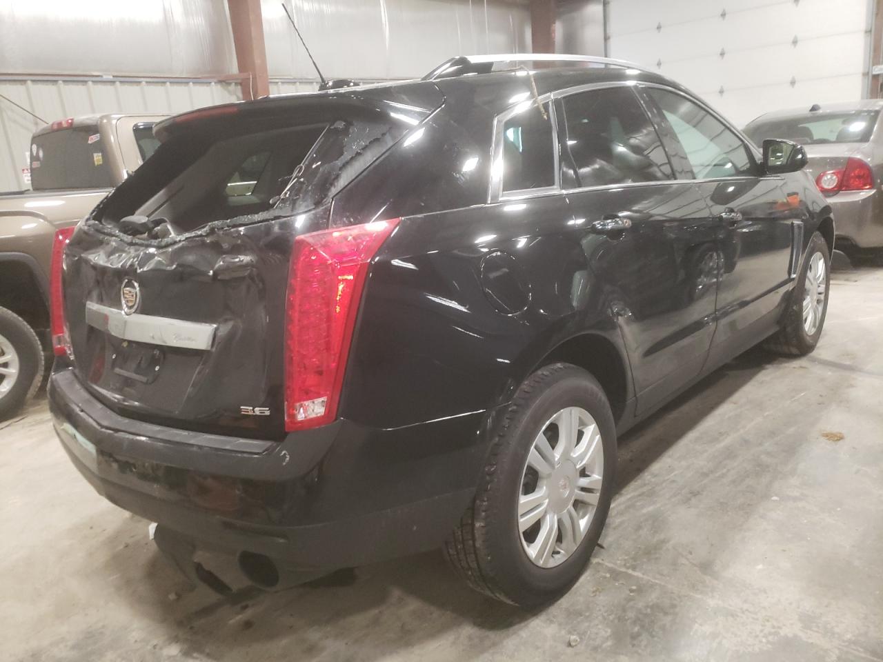 Photo 4 from auction – 2015 CADILLAC SRX LUXURY with VIN 3GYFNEE39FS547758