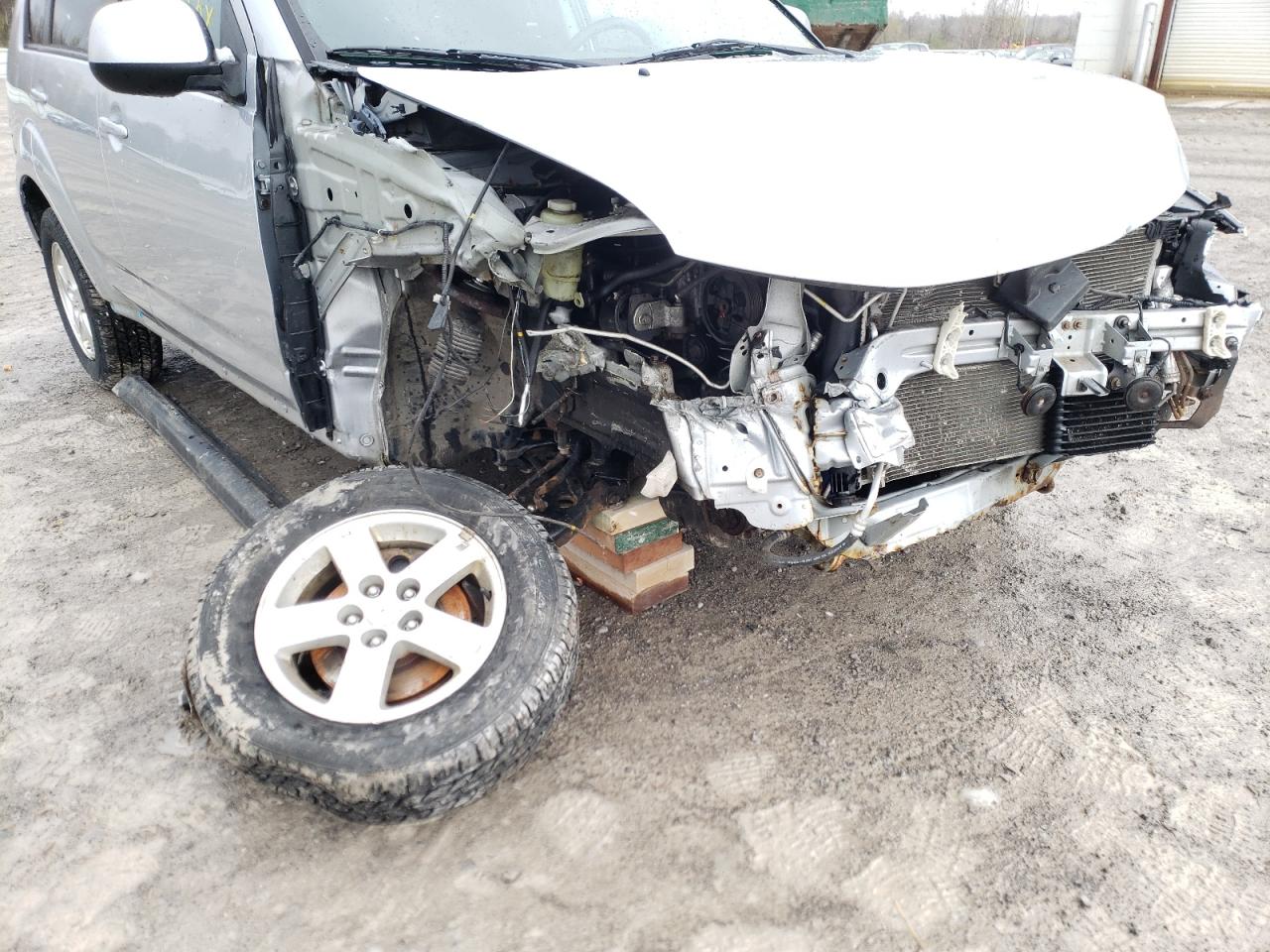 Photo 9 from auction – 2009 MITSUBISHI OUTLANDER with VIN JA4LT21W89Z010197