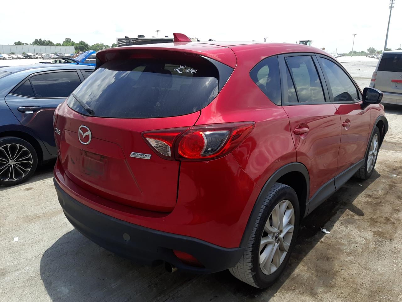 Photo 4 from auction – 2014 MAZDA CX-5 GT with VIN JM3KE2DY2E0384044