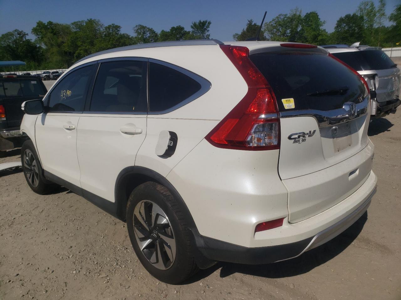 Photo 3 from auction – 2015 HONDA CR-V TOURI with VIN 5J6RM3H90FL019181
