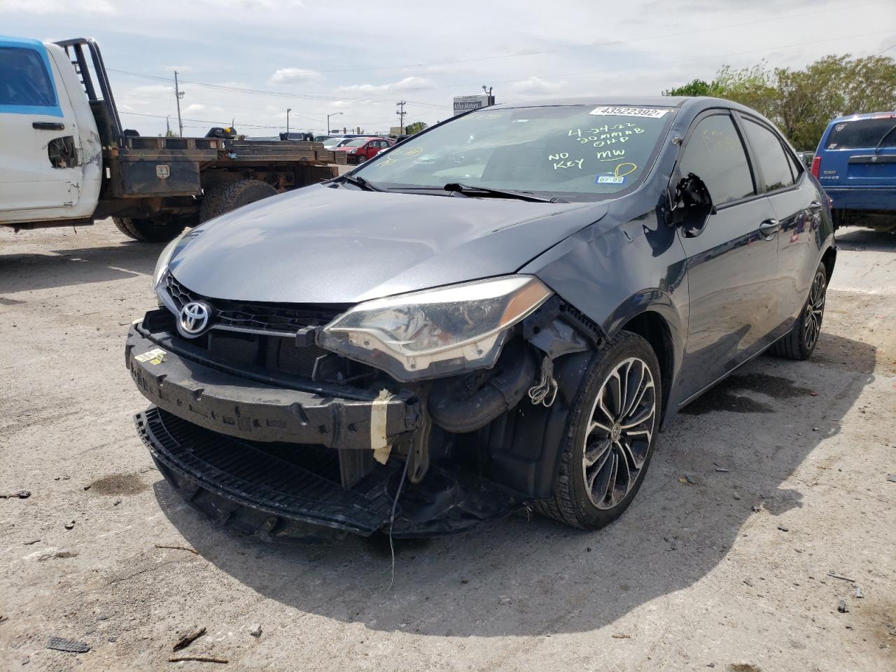 Photo 2 from auction – 2014 TOYOTA COROLLA L with VIN 5YFBURHE3EP141370