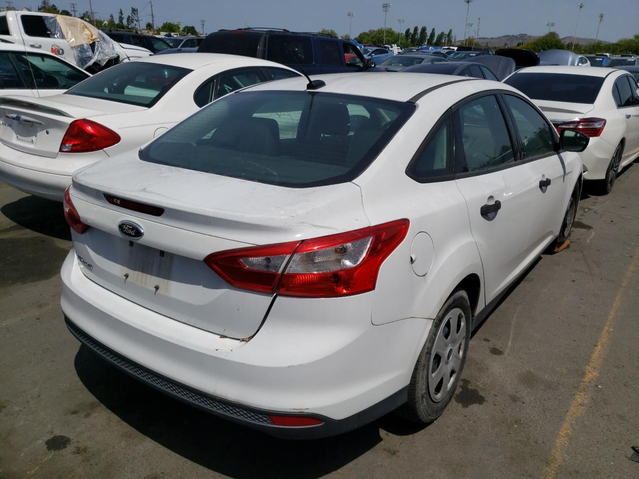Photo 4 from auction – 2014 FORD FOCUS S with VIN 1FADP3E27EL224970