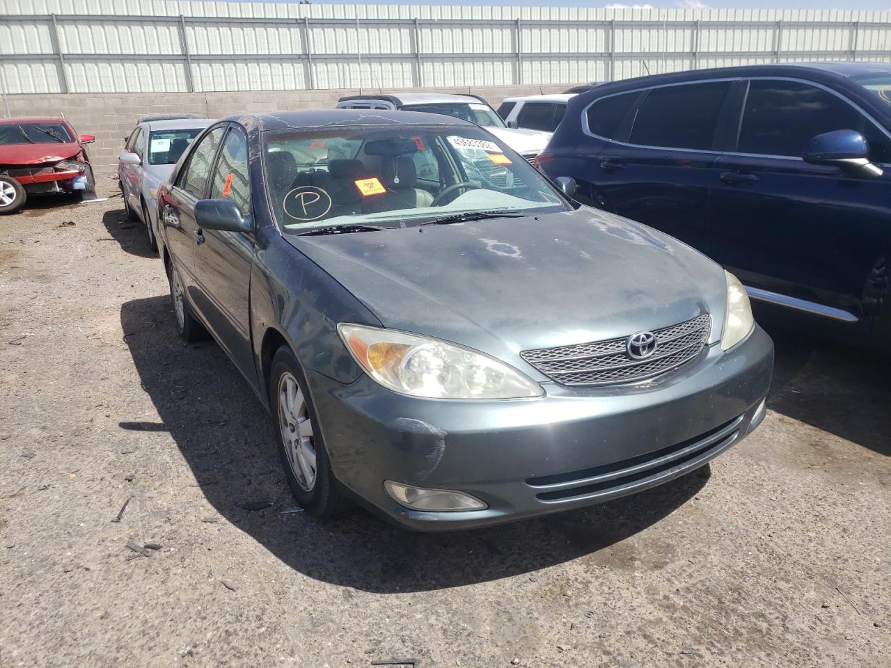 TOYOTA CAMRY LE 2003 with VIN 4T1BE30K33U746772 - Photo from auction