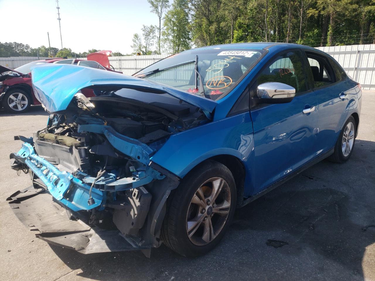 Photo 2 from auction – 2014 FORD FOCUS SE with VIN 1FADP3F23EL152843