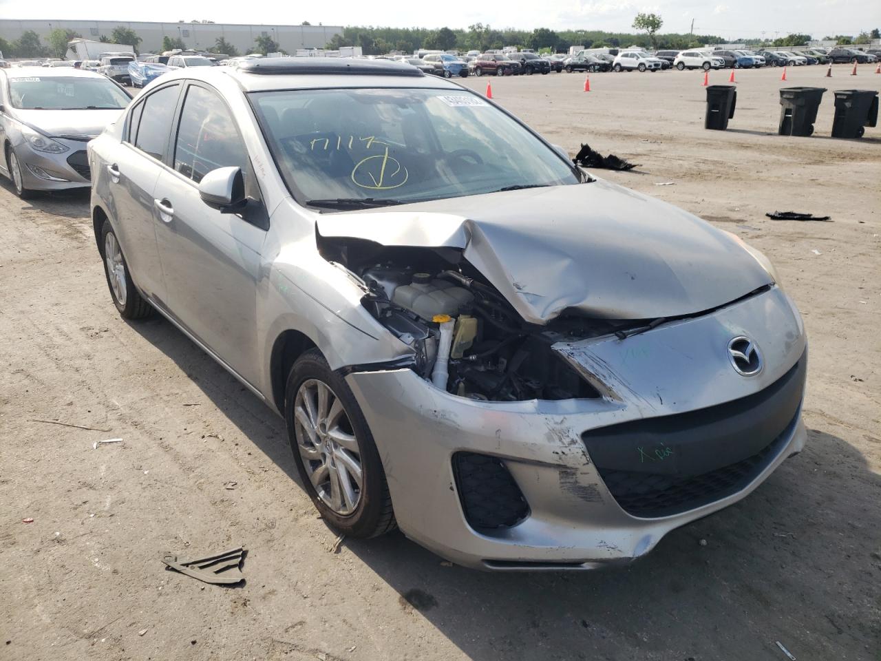 MAZDA 3 I 2012 with VIN JM1BL1W74C1693485 - Photo from auction