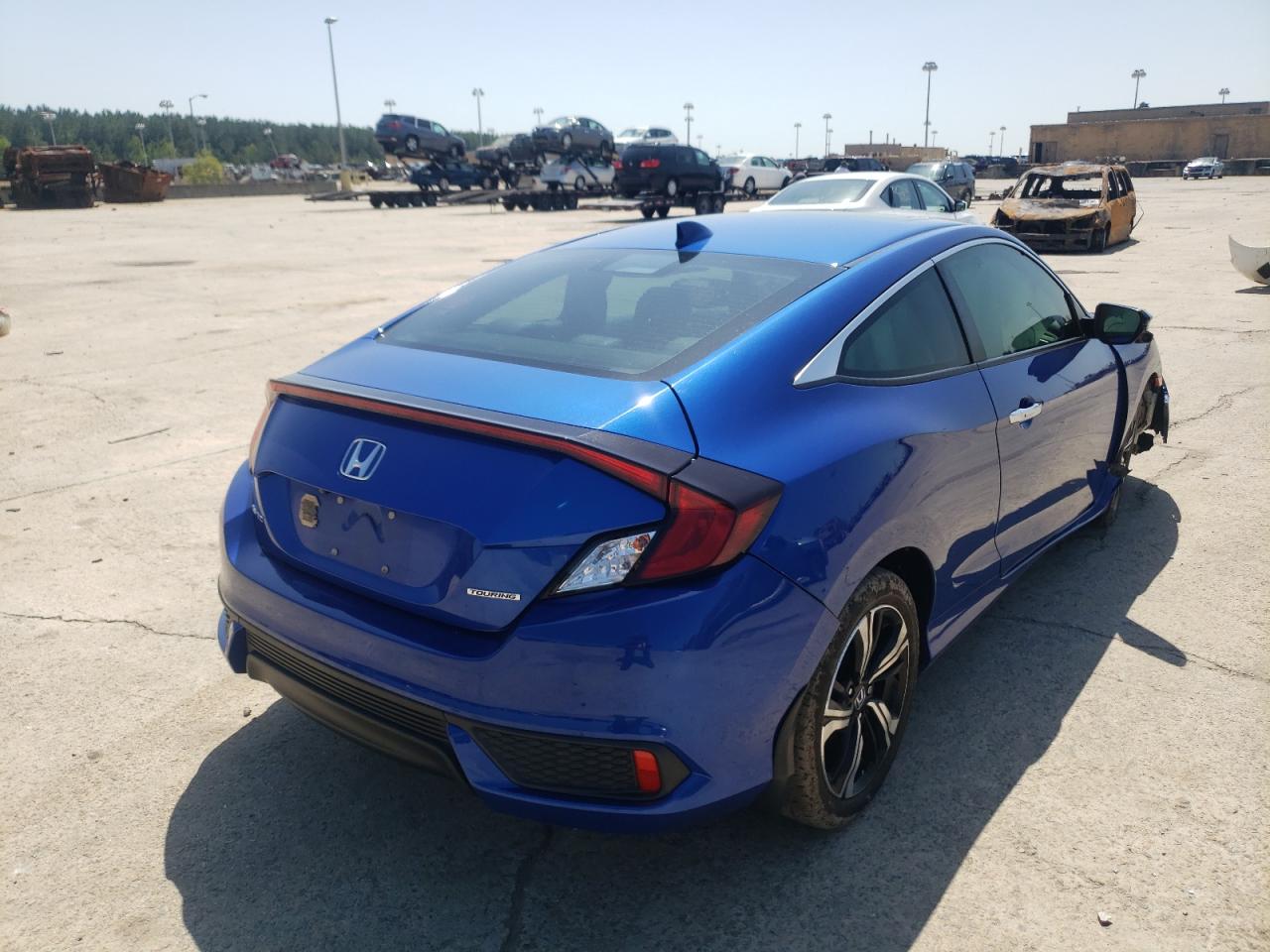 Photo 4 from auction – 2017 HONDA CIVIC TOUR with VIN 2HGFC3B99HH356986