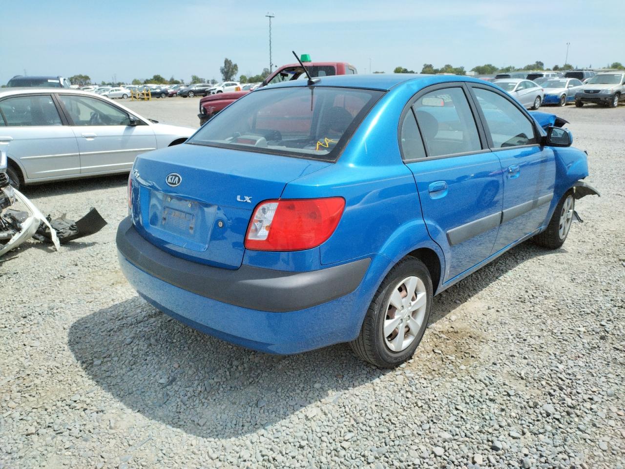 Photo 4 from auction – 2009 KIA RIO BASE with VIN KNADE223896567599