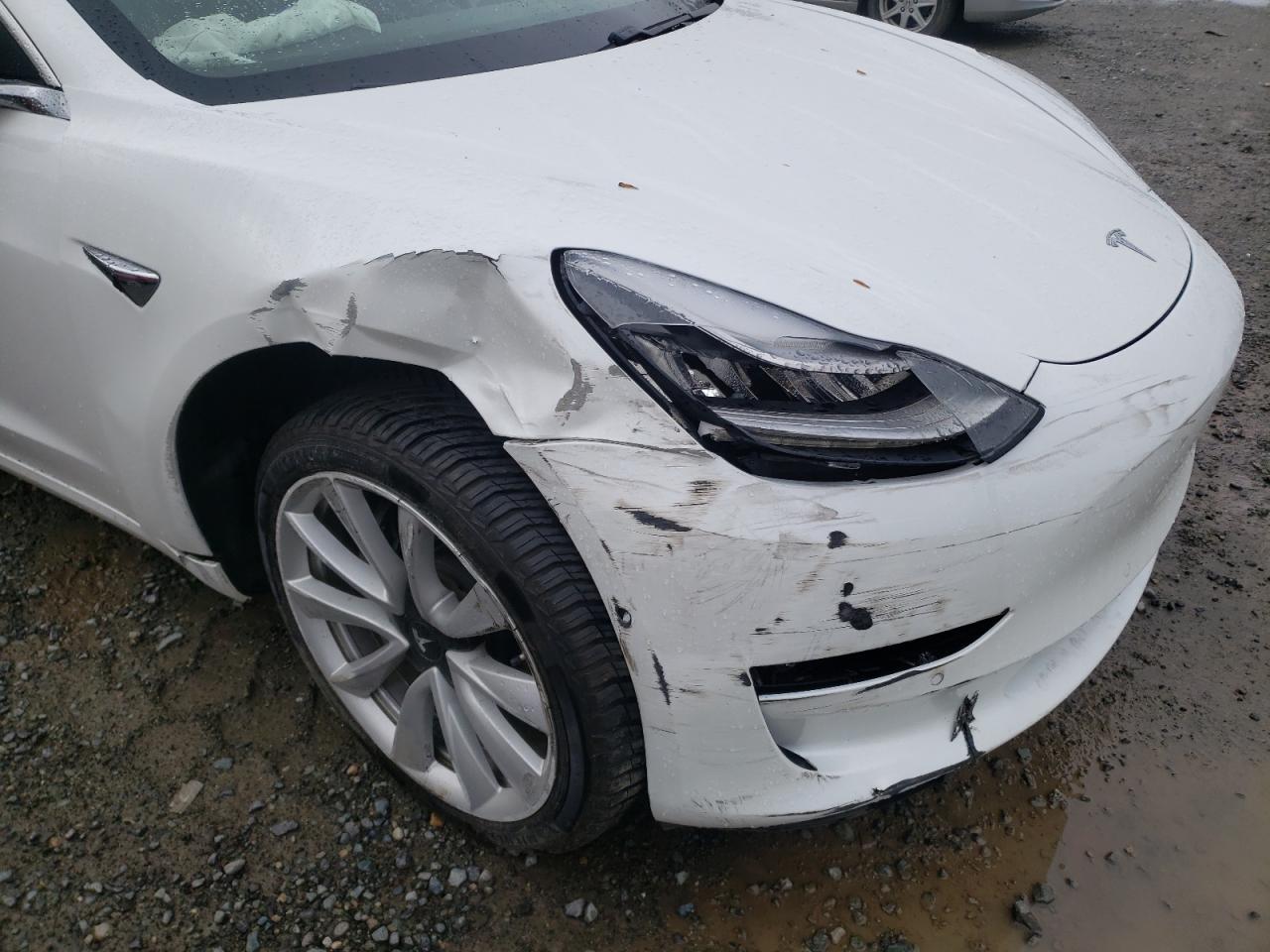 Photo 9 from auction – 2017 TESLA MODEL 3 with VIN 5YJ3E1EA3HF002098
