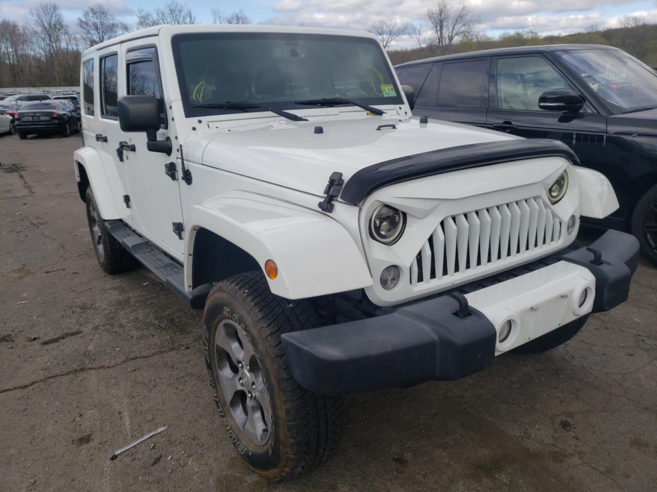 JEEP WRANGLER U 2016 with VIN 1C4HJWEG8GL148057 - Photo from auction