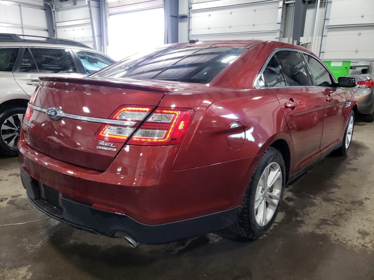 Photo 4 from auction – 2014 FORD TAURUS SEL with VIN 1FAHP2E86EG128823