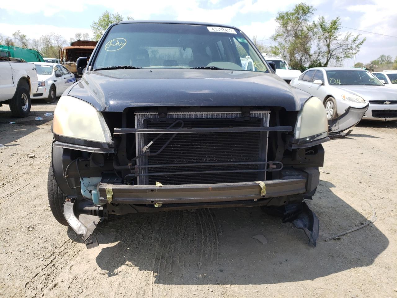 Photo 9 from auction – 2005 HONDA PILOT EX with VIN 5FNYF18425B009371