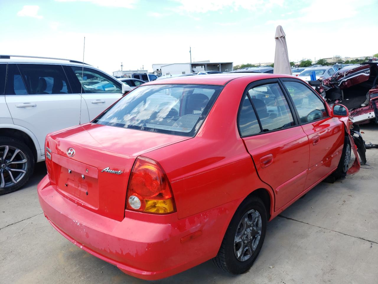 Photo 4 from auction – 2005 HYUNDAI ACCENT GL with VIN KMHCG45C45U655177
