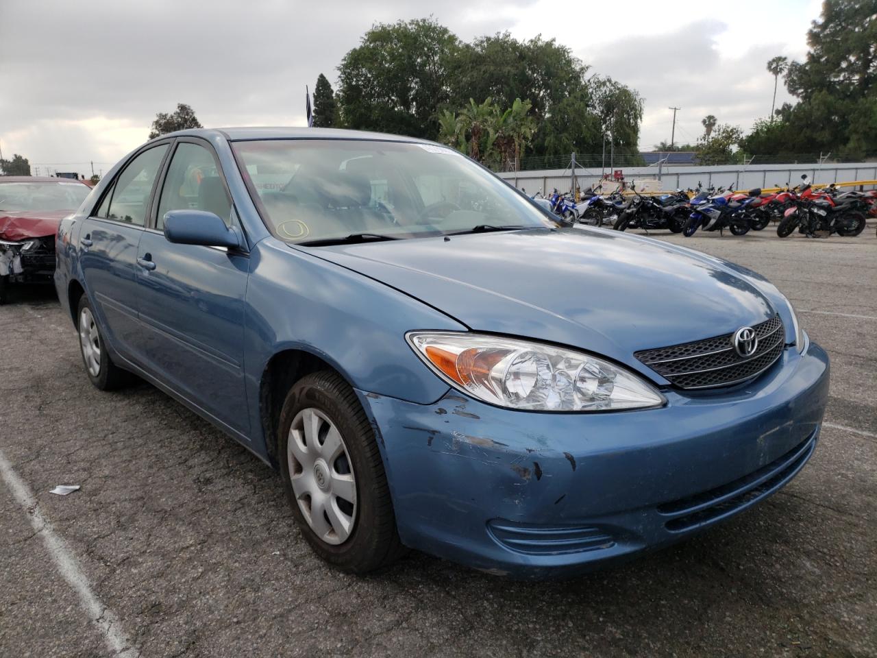 TOYOTA CAMRY LE 2004 with VIN 4T1BE32K44U804502 - Photo from auction