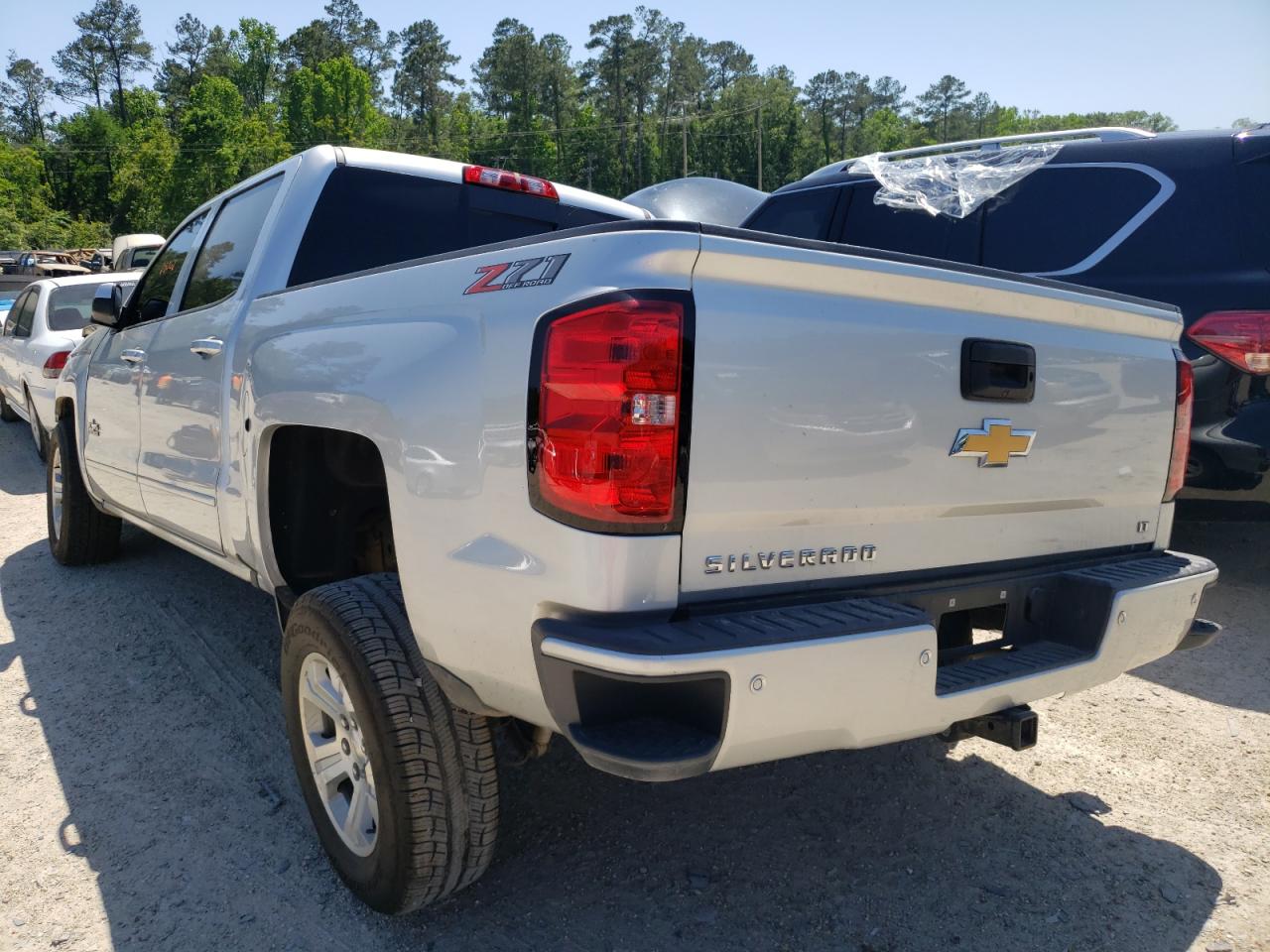 Photo 3 from auction – 2018 CHEVROLET SILVERADO with VIN 3GCUKREC0JG389366