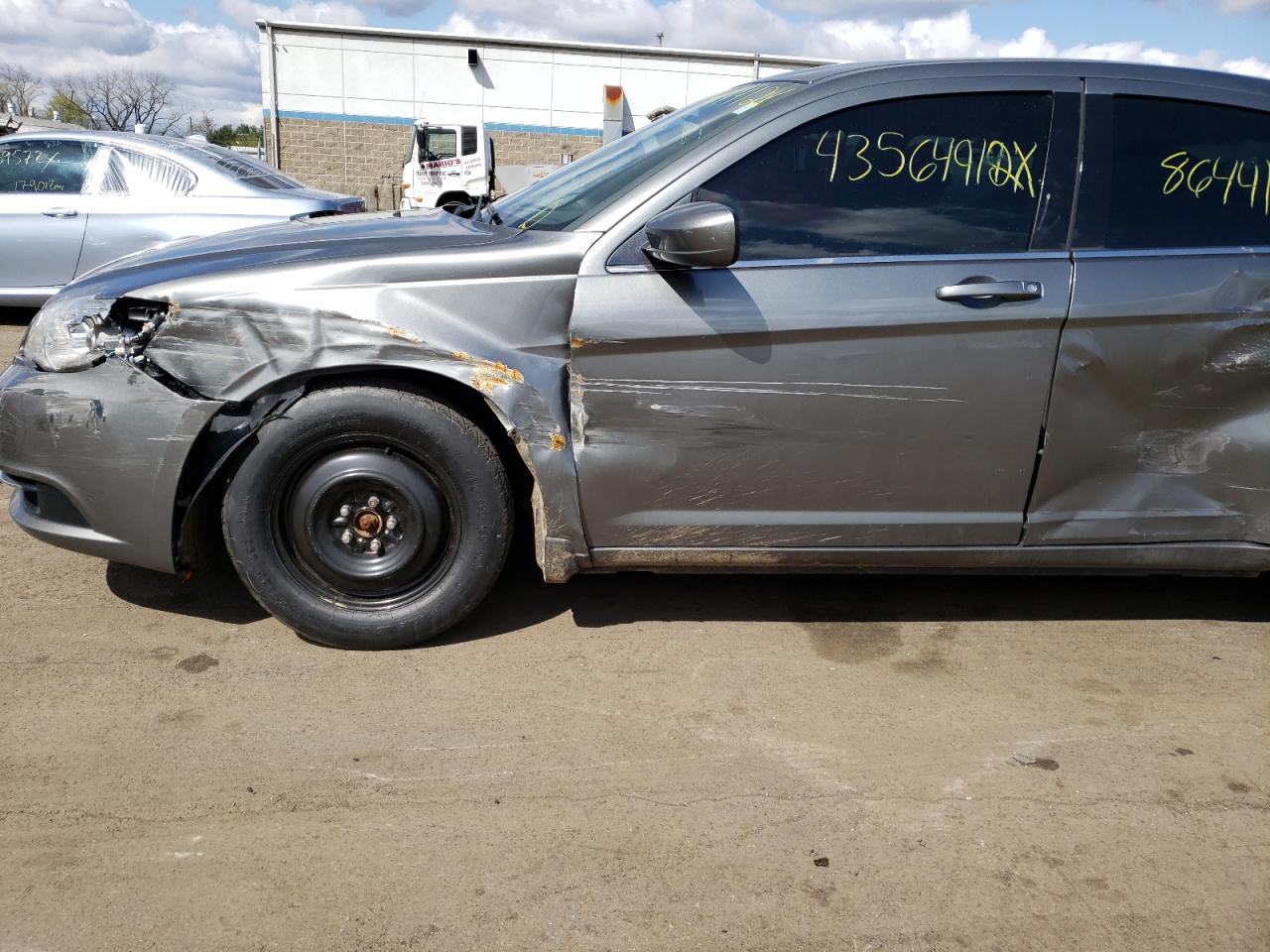 Photo 9 from auction – 2013 CHRYSLER 200 TOURIN with VIN 1C3CCBBB8DN696022