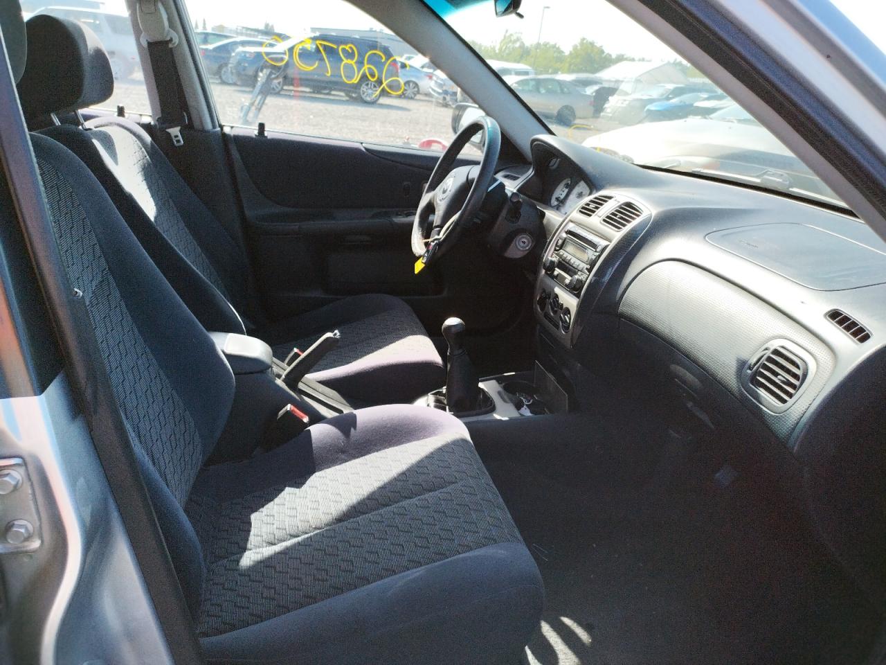 Photo 5 from auction – 2002 MAZDA PROTEGE PR with VIN JM1BJ245121566530