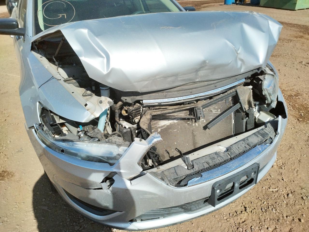 Photo 9 from auction – 2015 FORD TAURUS SE with VIN 1FAHP2D81FG184543