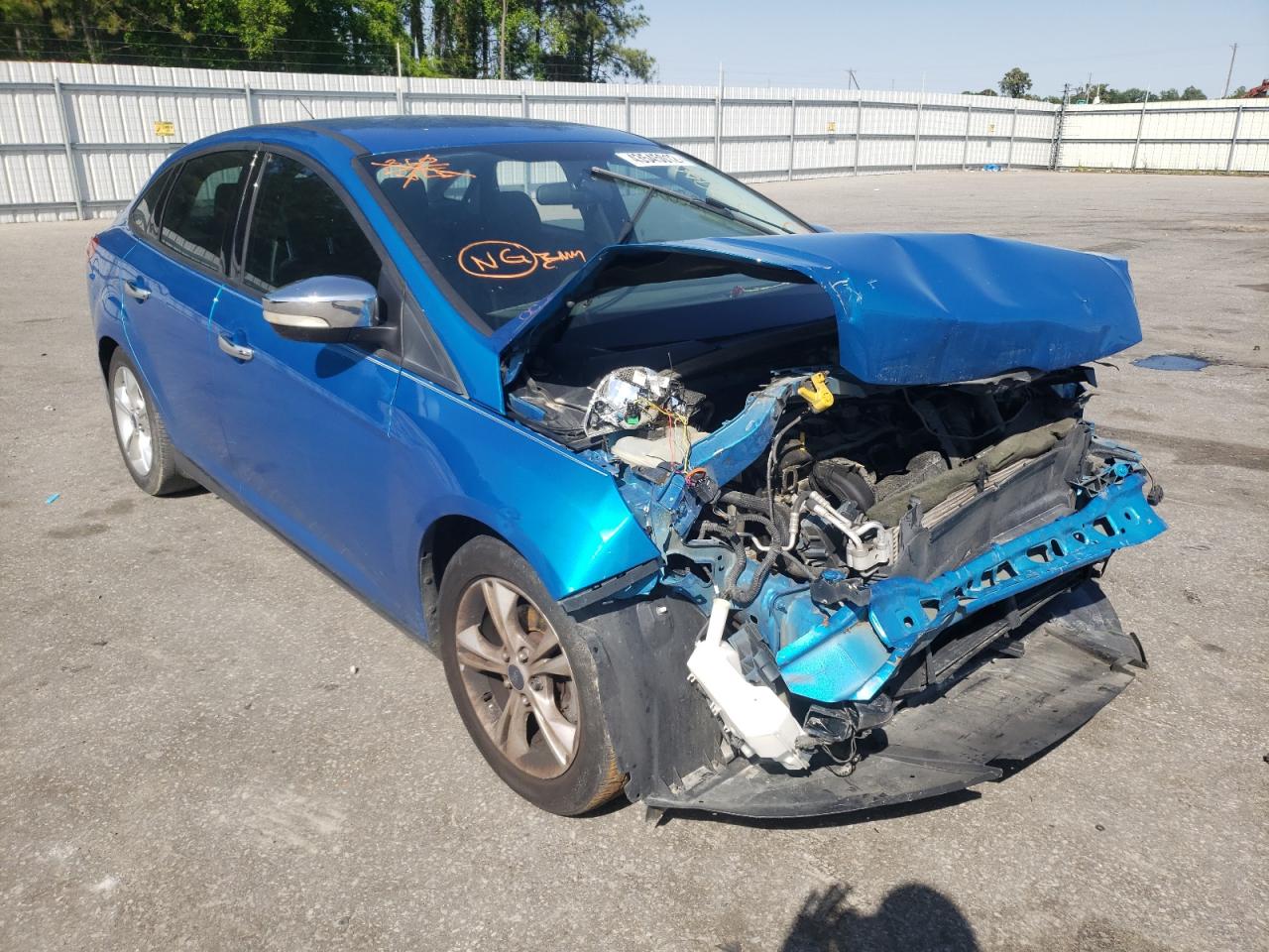 FORD FOCUS SE 2014 with VIN 1FADP3F23EL152843 - Photo from auction