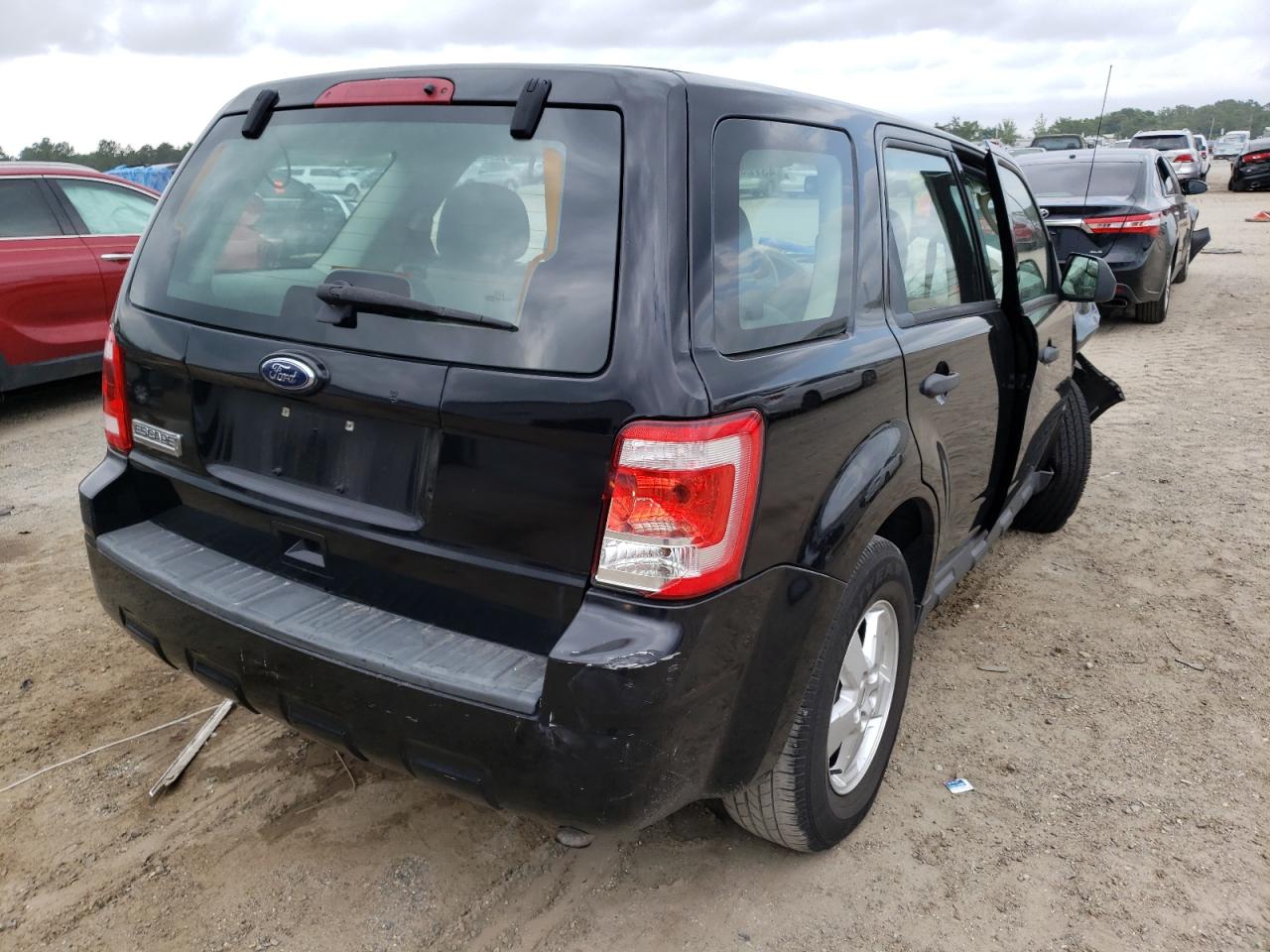 Photo 4 from auction – 2010 FORD ESCAPE XLS with VIN 1FMCU0C79AKD37424