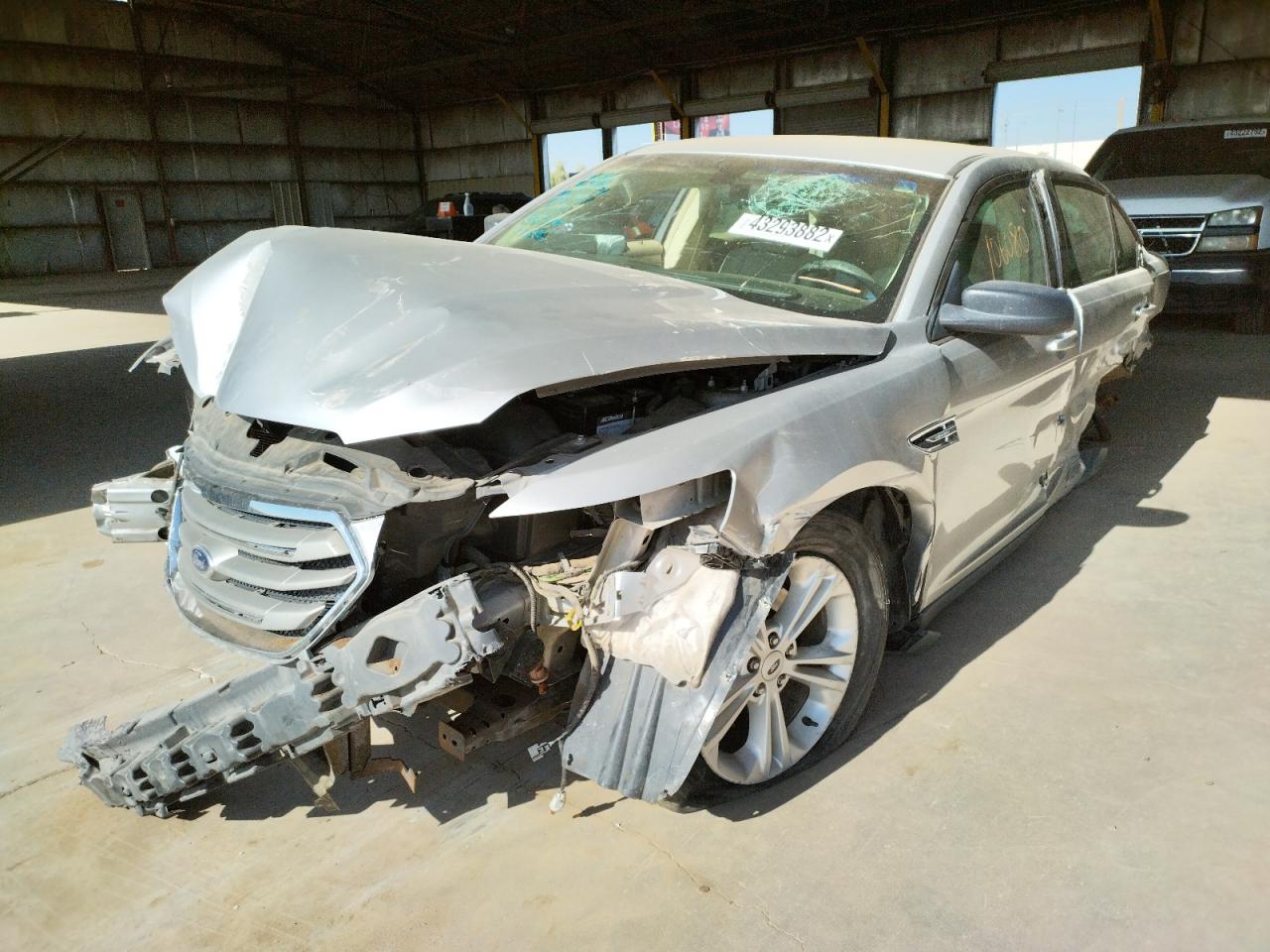 Photo 2 from auction – 2015 FORD TAURUS SE with VIN 1FAHP2D88FG204044